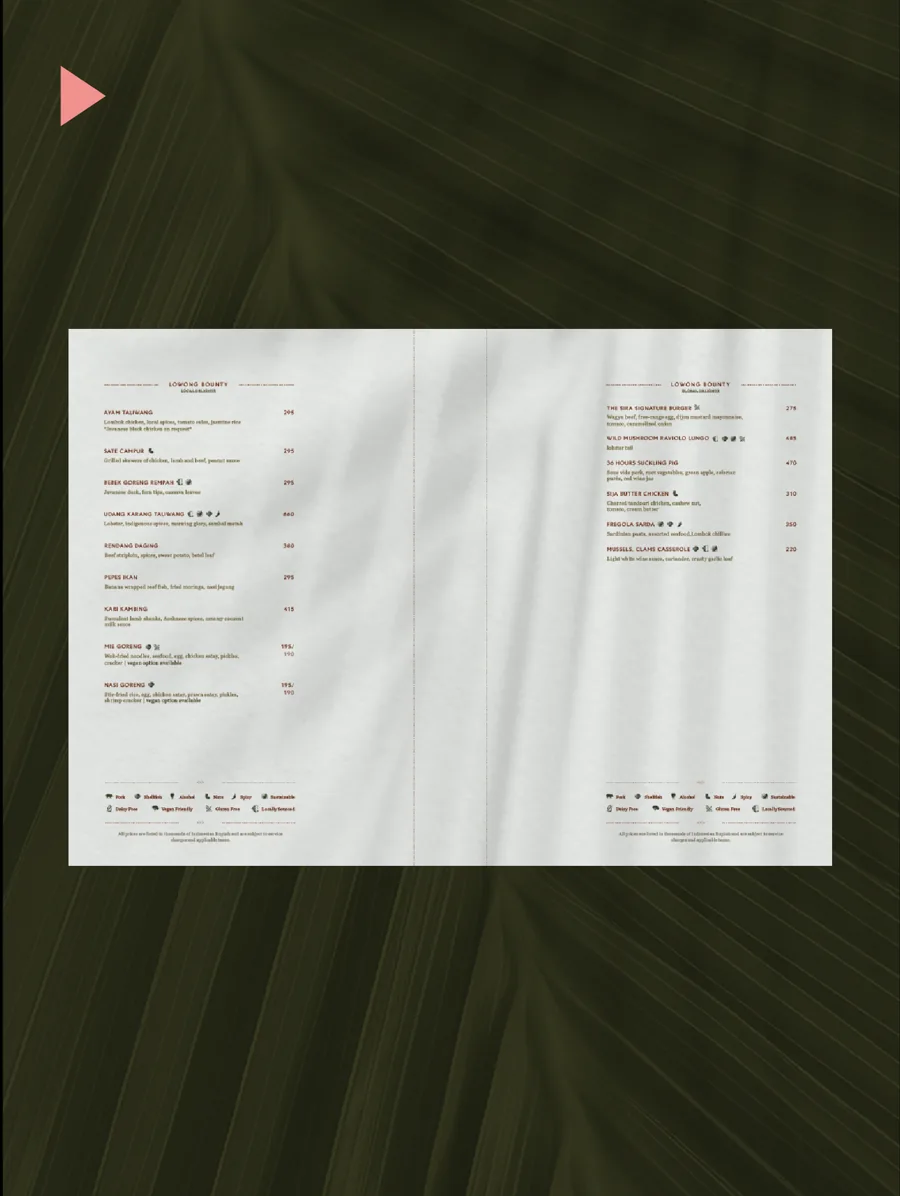 Printed menu spread on a palm-leaf background