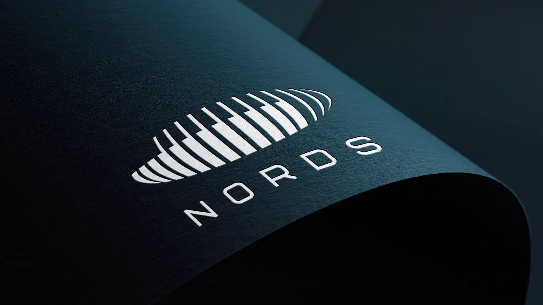 The Nords logo in white on folded dark teal fabric