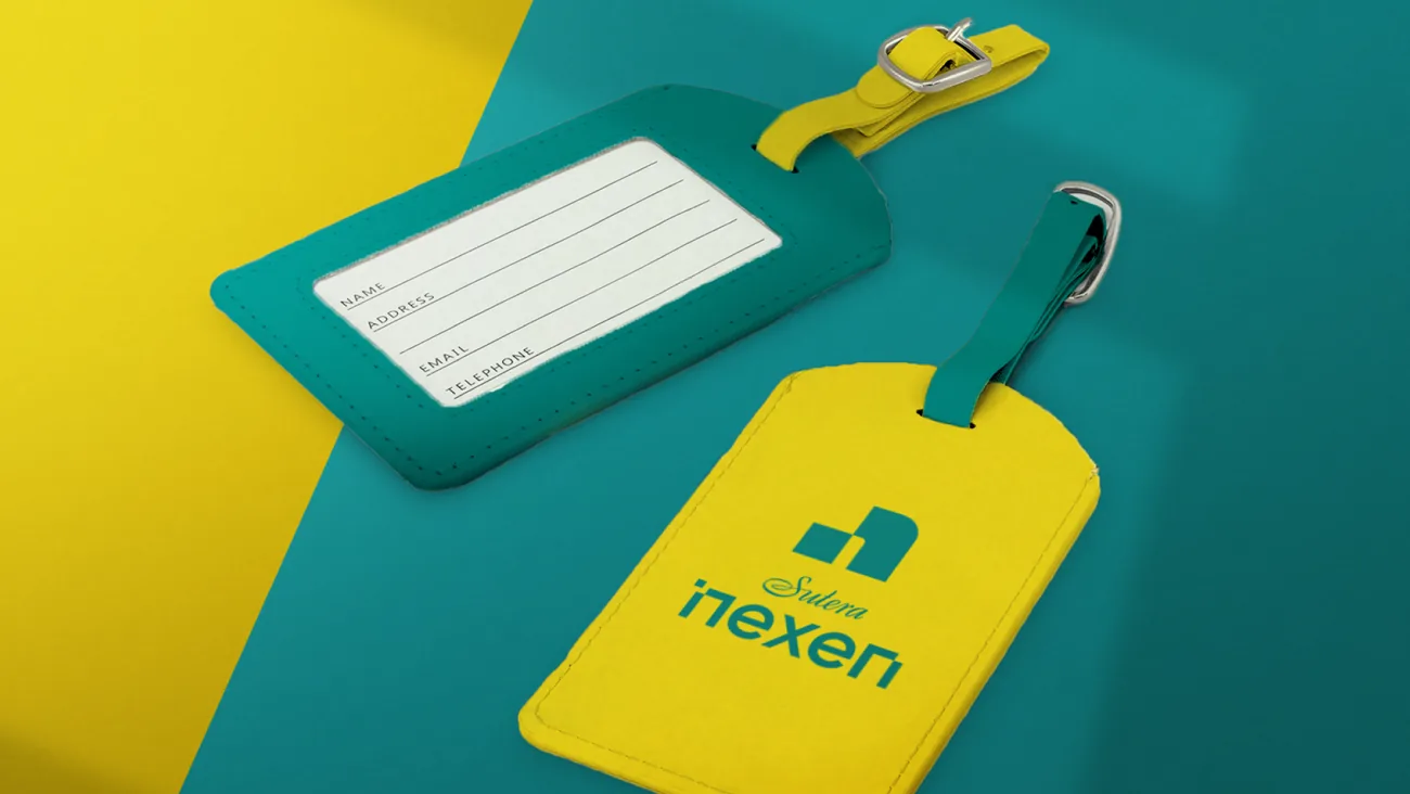 Yellow and teal Nexen luggage tags
