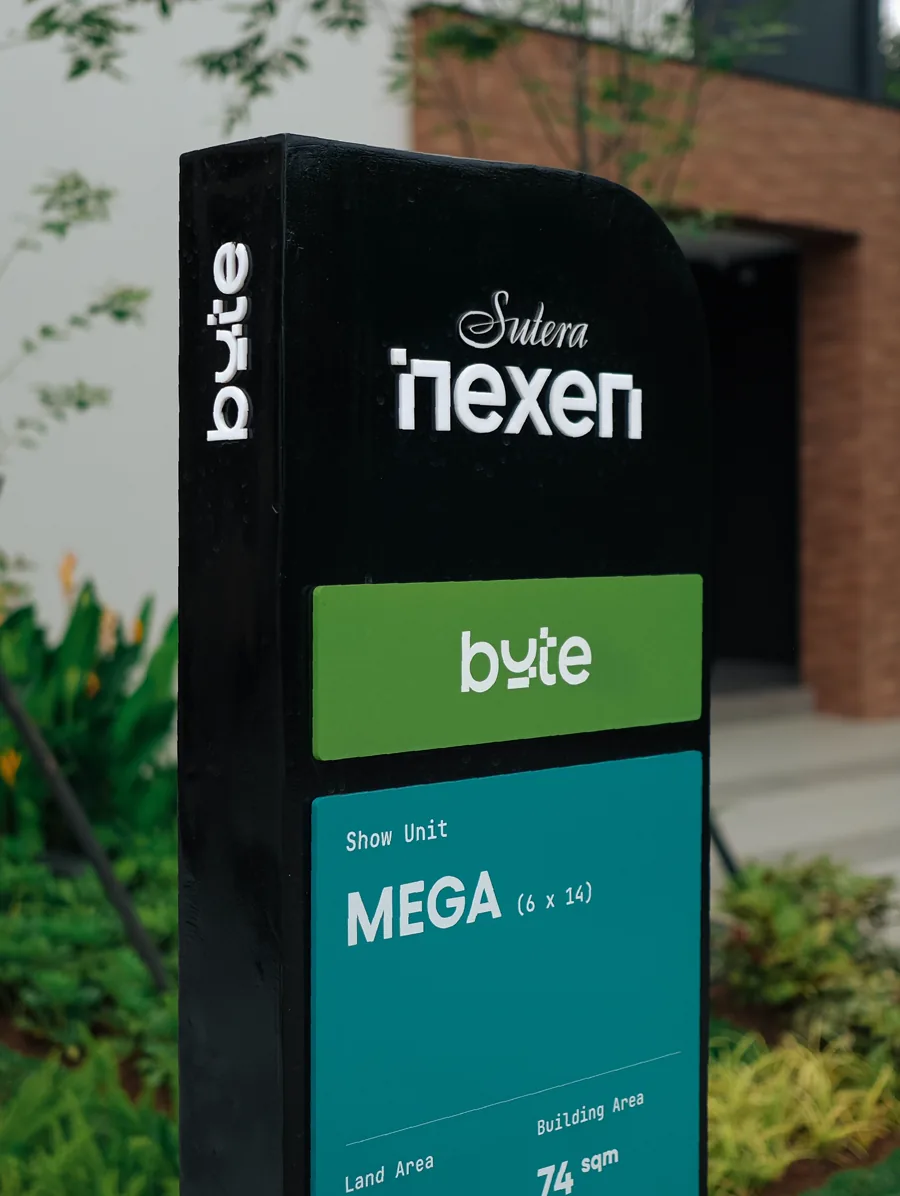 Close-up of a black totem with a green byte plate, MEGA type