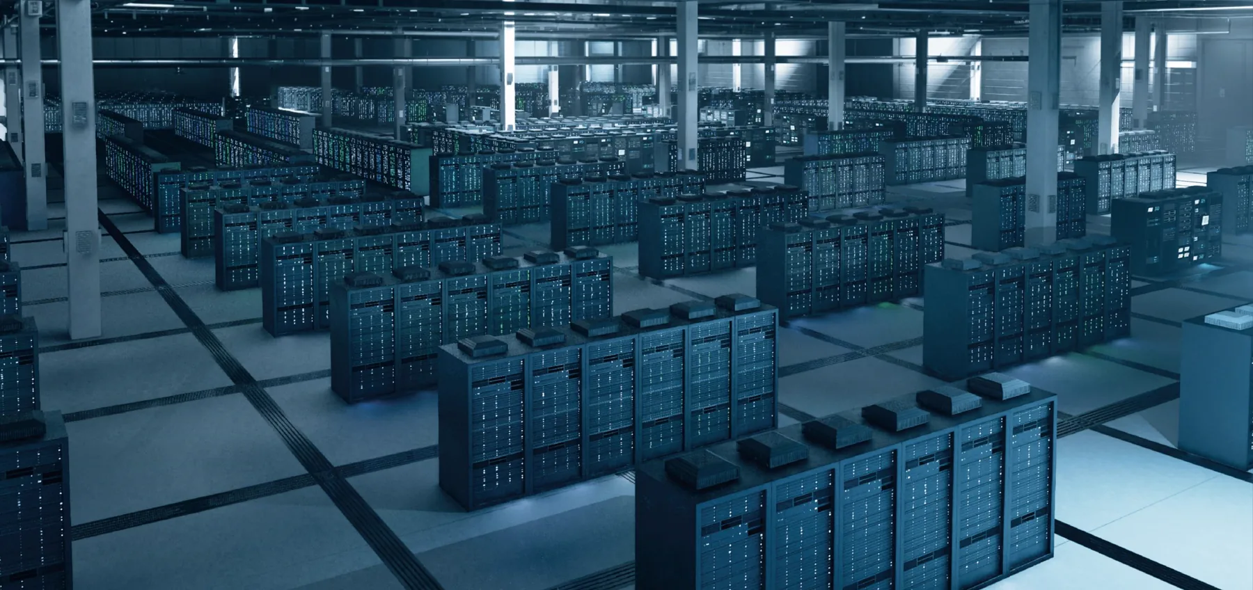Interior of a data center hall with rows of server cabinets in blue light
