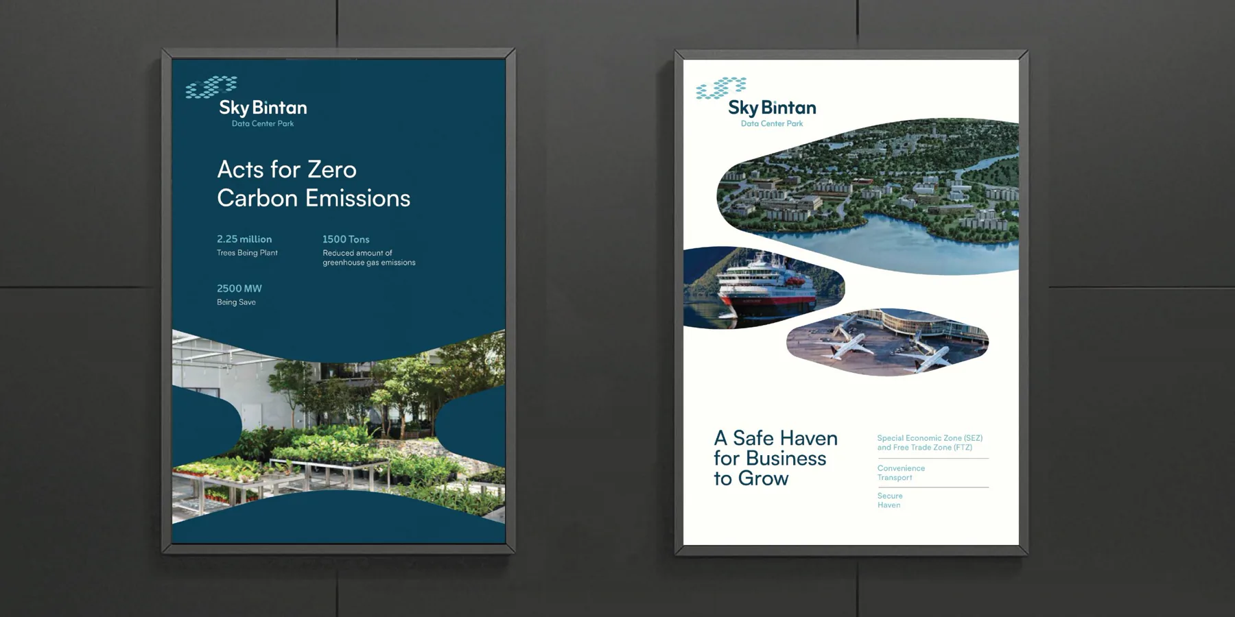 Two framed posters, “Acts for Zero Carbon Emissions” and “A Safe Haven for Business to Grow”, on a dark wall