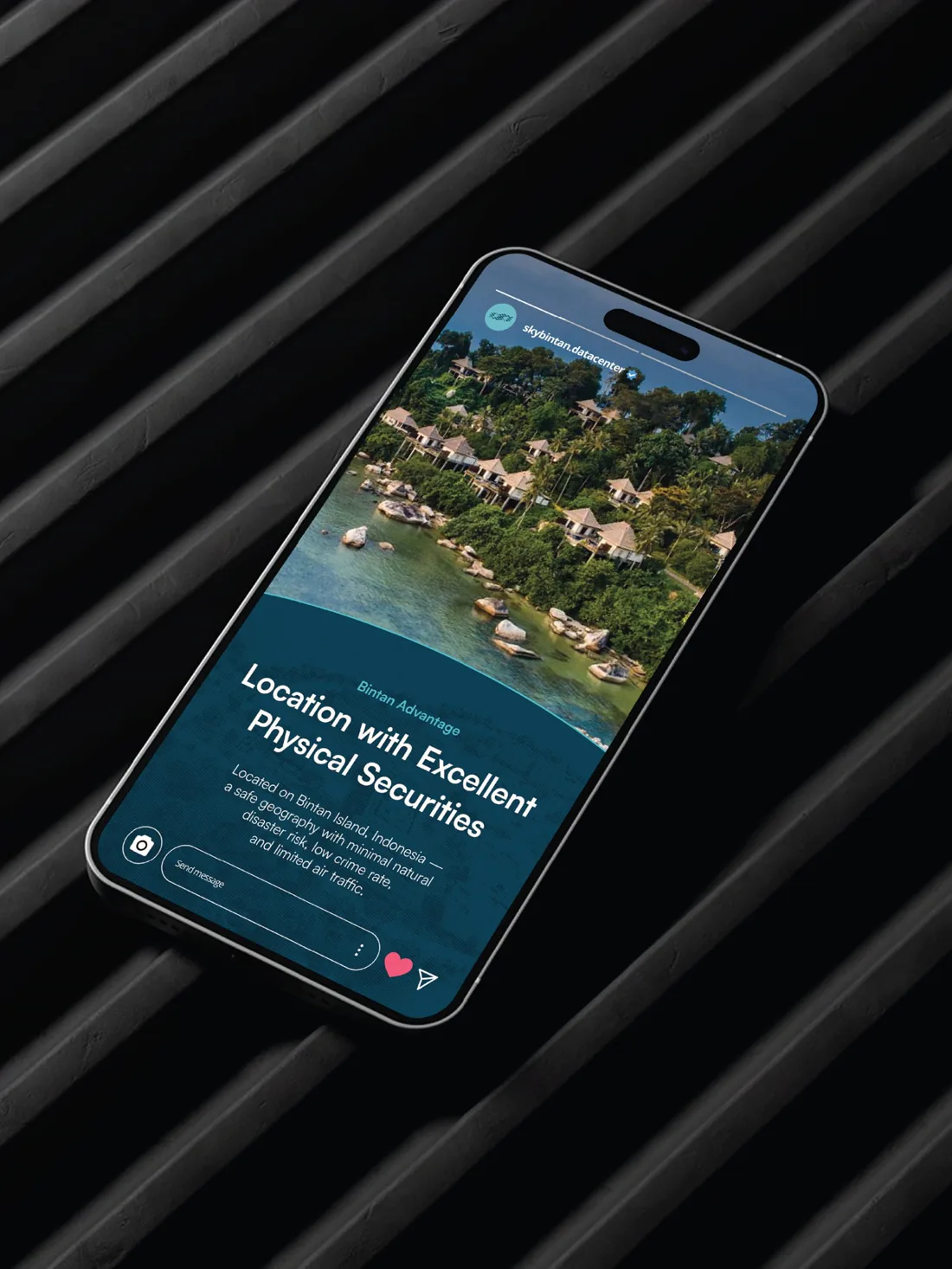 Phone showing a Sky Bintan social post, “Location with Excellent Physical Securities”, over an aerial photo